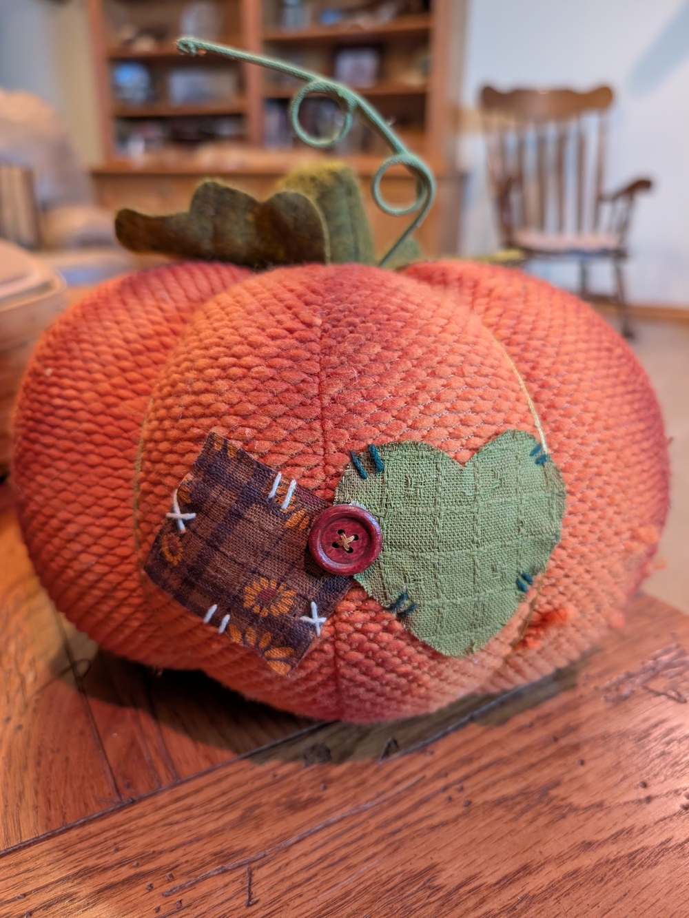 Handcrafted Orange Fabric Pumpkin Accent with Green Leaf Detail